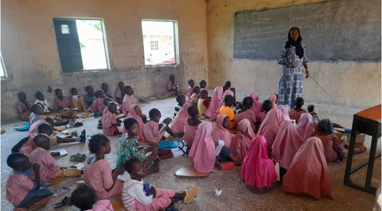 Adamawa school teachers, pupils sit on bare floor