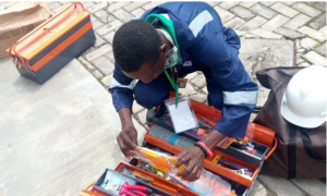 A beneficiary arranging his tool kit