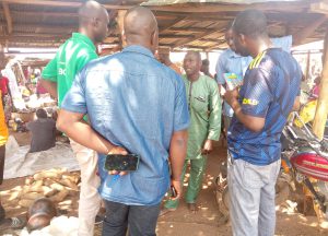 Community farmers discussing climate change with MAWA officials