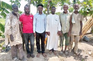 MAWA officials photograph with the farmers 